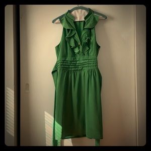 Green dress with gold buttons ruffle collar